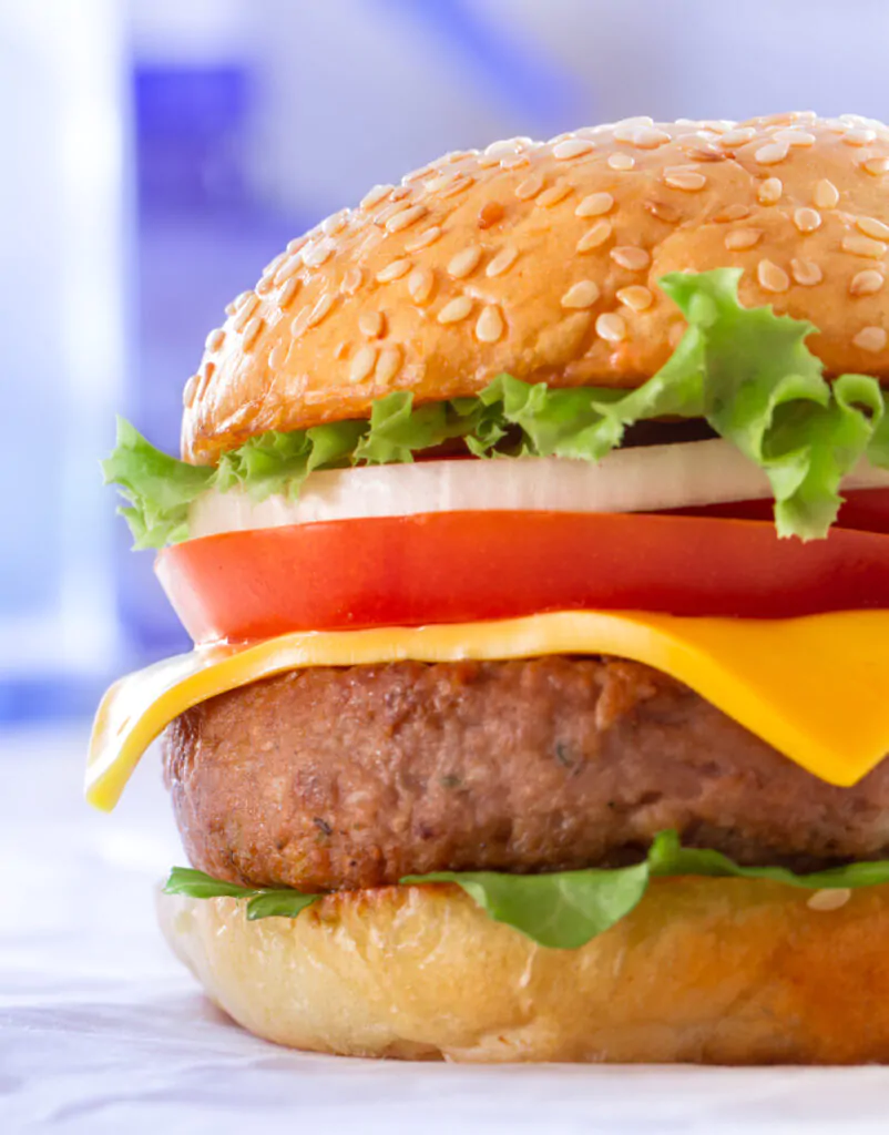 Beautiful and juicy burger close-up. Food is a series of fast-food.